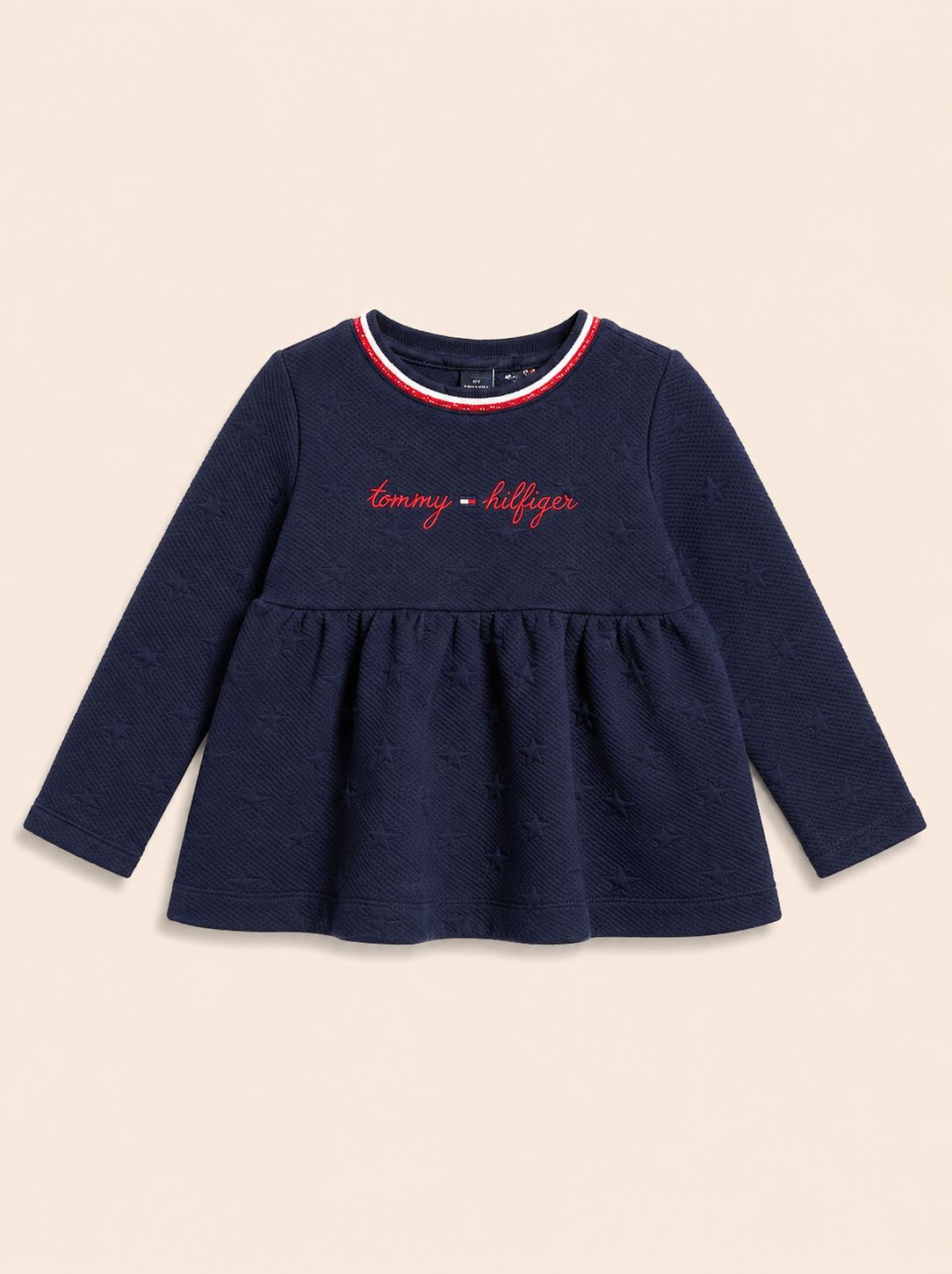 Polera azul letras rojas